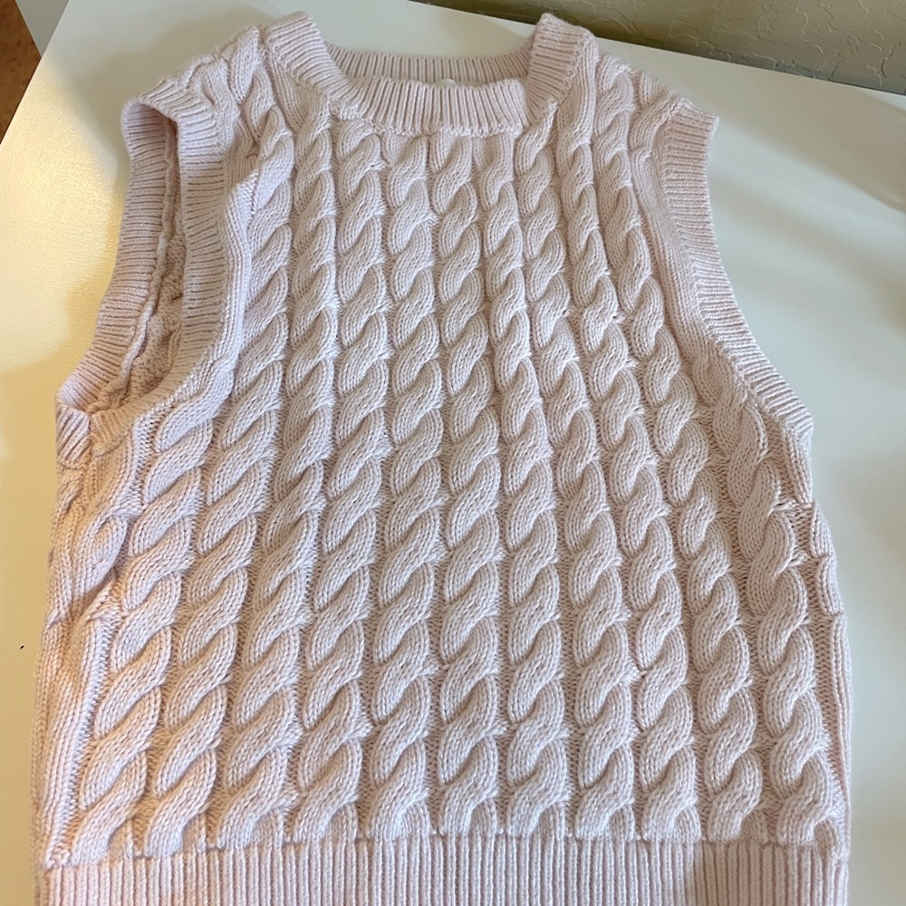 Pink sweater vest